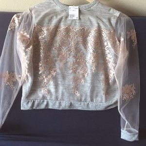 Grey sweater with sheer lace detail